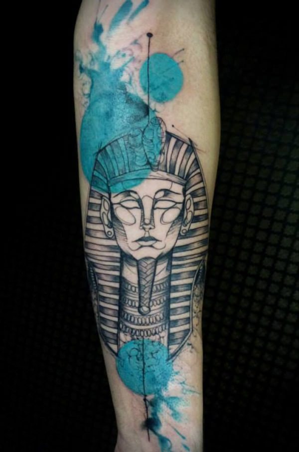 Black and White Pharaoh Tattoo with Splashes of Blue Watercolor Ink