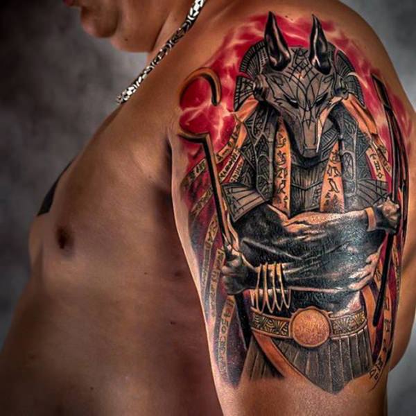 Bold and Fearsome Upper Arm Egyptian Creature Tattoo