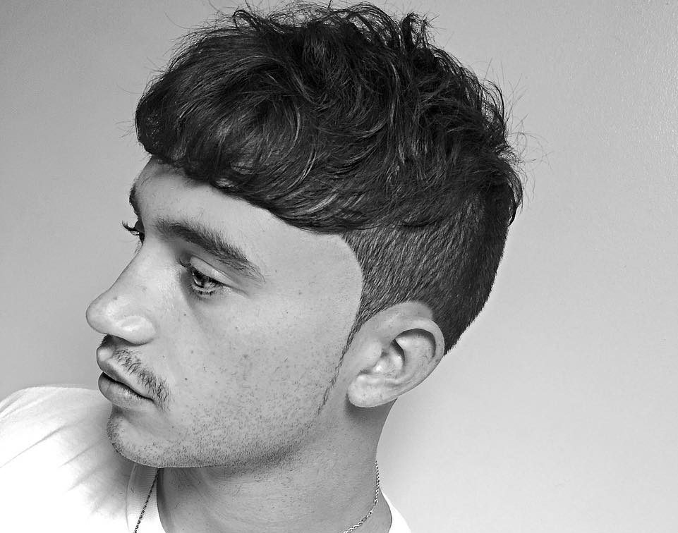 Combed Forward Fringe with Undercut and Creative Sideburns Idea for Men