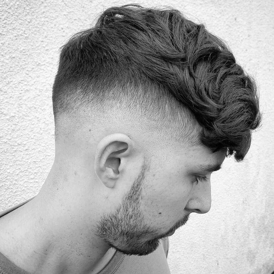 Drop Fade Hairdo with Thick Head of Hair on Top