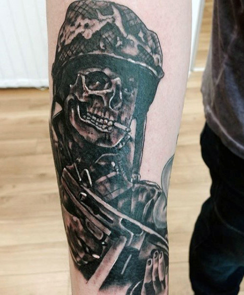 Forearm Tattoo of a Skeleton Holding a Military Weapon