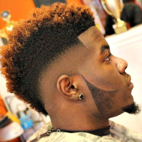 High Fade Wavy Hairstyle for Men with Unique Facial Hair