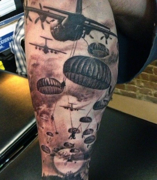 Military-Related Parachutes as a Calf Tattoo