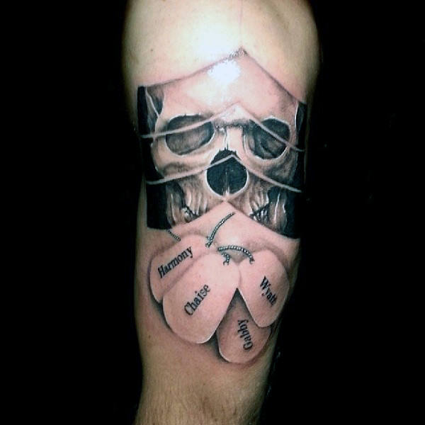 Skull and Army Symbol Tattoo with Dog Tags of the Names of Lost Loved Ones