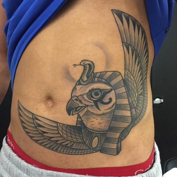 Snake and Eagle Egyptian Rib Cage Stomach Tattoo Idea