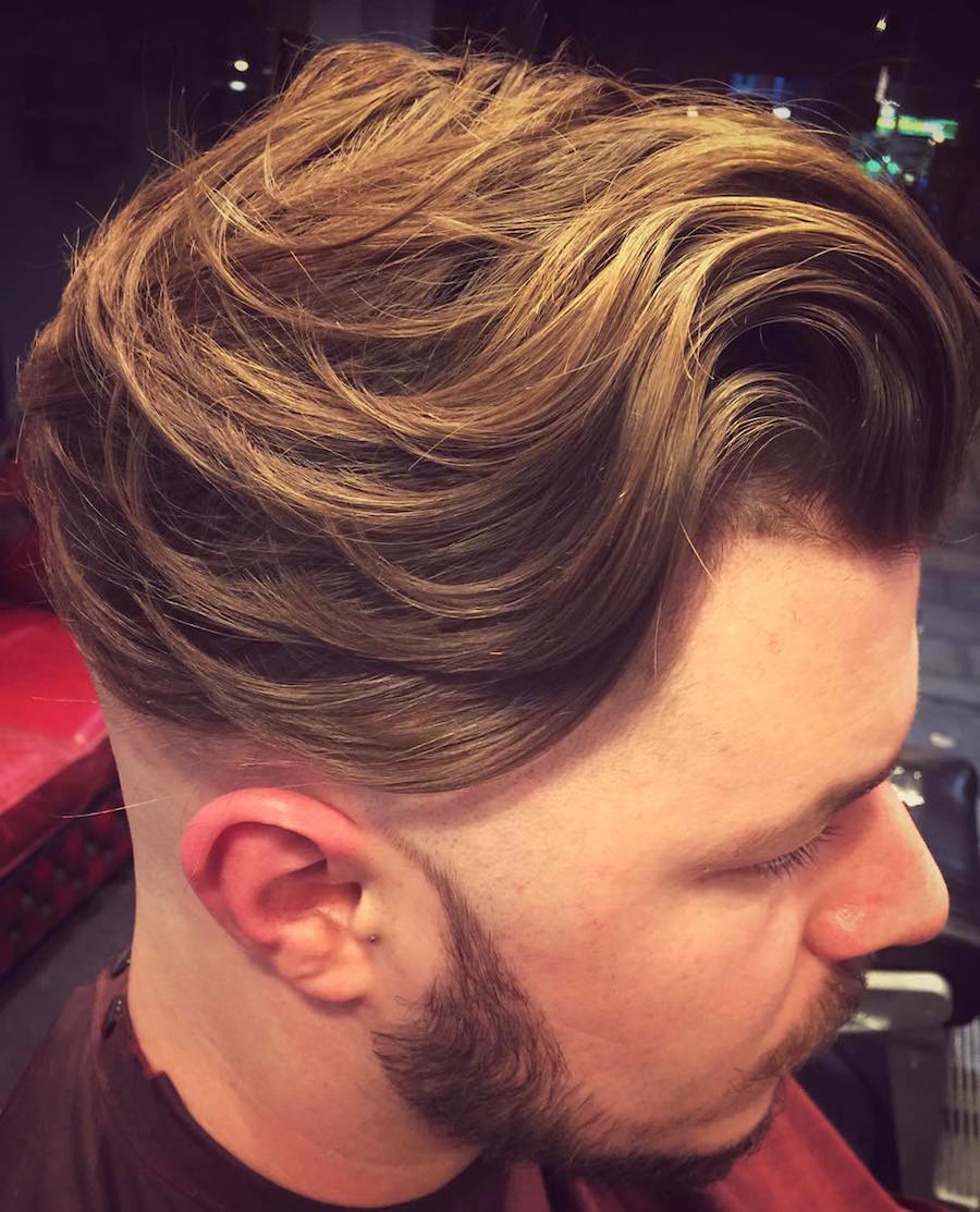 Wavy Hair on Top Paired with a Subtle Undercut for Men
