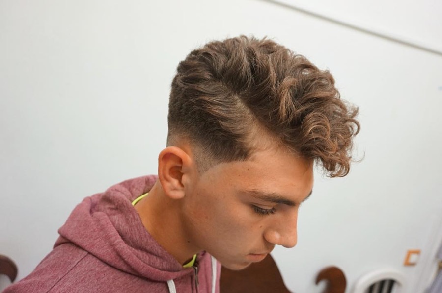 Wavy Hairstyle for Men with a Side Part