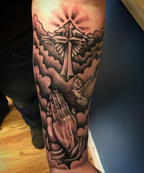Cartoon-Like Christian Tattoo with Prayer Hands and Doves Flying in the Clouds