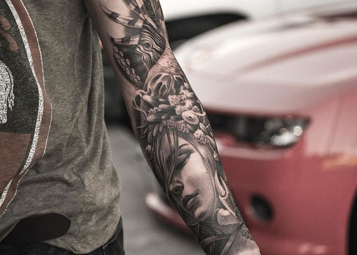 Forearm Sleeve of a Woman Wrapped in Flowers