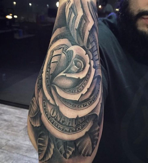 Forearm Tattoo of a Rose Made From Hundred Dollar Bills