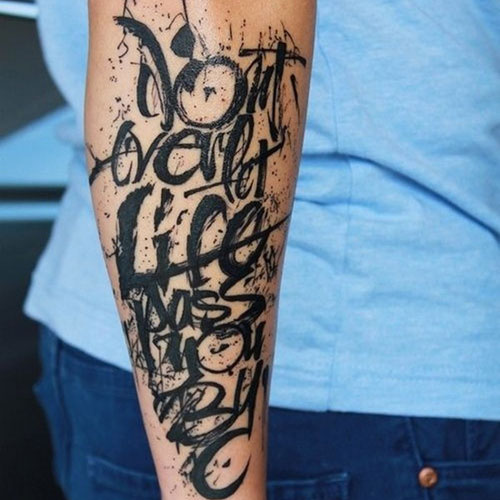 Grafitti Art Forearm Quote Tattoo
