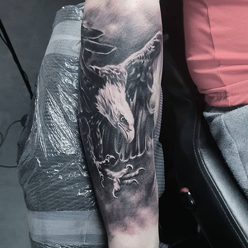 Half Sleeve Soaring Eagle and Mountain Tattoo Idea