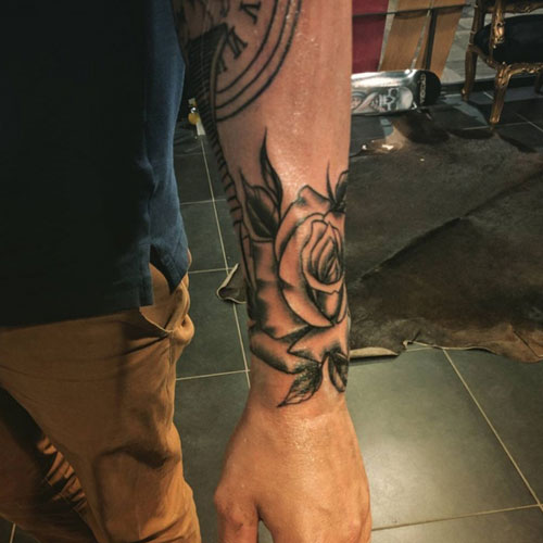 Multiple Smaller Pieces that Create One Forearm Tattoo