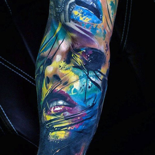 Neon Watercolor Forearm Tattoo of a Female Portrait