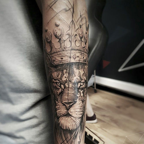 Tattoo of a Lion Wearing a Crown