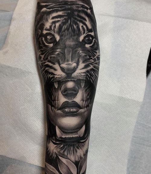 Woman and Tiger Collaborative Forearm Tattoo