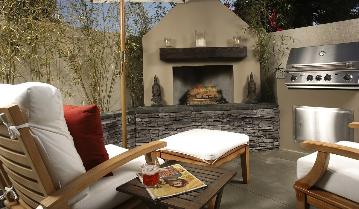 outdoor furniture near a fireplace